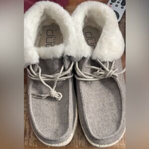 Hey Dude shoes women’s size 11.
